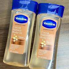 Buy the original How to Use Vaseline Cocoa Radiant Body Oil To get rid of Dry Skin in Lagos Nigeria